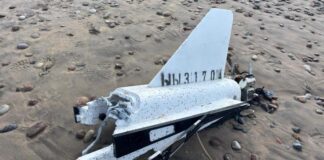 drona atlūza ventspils, drons izskalots jūrā, NBS pārbauda dronu, ventspils pludmale drošība, atrasta drona daļa latvijā, drona atlūzas kirilica