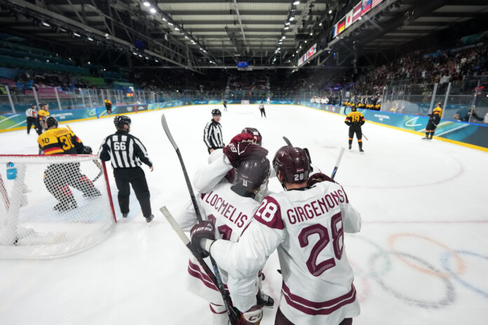 Latvijas hokeja izlase, olimpiskais hokeja turnīrs, Latvija Vācija 4:3, Dans Ločmelis, Eduards Tralmaks, Renārs Krastenbergs, Artūrs Šilovs, NHL spēlētāji olimpiskajās spēlēs, C grupa, ASV Latvija, olimpiskais hokejs