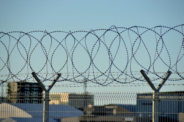 fence with barbed wire