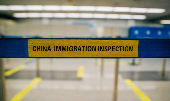 uzraksts China Immigration Inspection